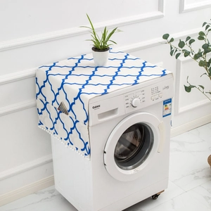 Blue geometric refrigerator dust cover with storage pockets and white tassel fringe