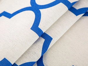 Detailed macro view of blue Moroccan pattern on high-quality cotton linen microwave cover