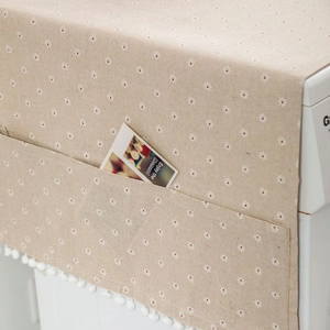 Daisy print refrigerator dust cover with storage pockets and white pom pom tassels