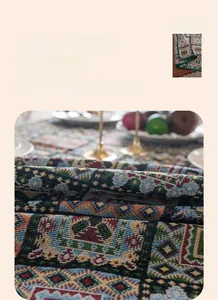 Detailed close-up of heavy jacquard weave fabric with vintage bohemian geometric pattern