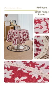 Detail of red rose jacquard fabric with white fringe tassels on round tablecloth