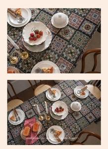 Close-up of geometric jacquard patterns and vintage embroidery on a bohemian tablecloth