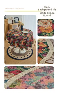 Detailed view of paisley floral tablecloth with white tassels on a round black fabric
