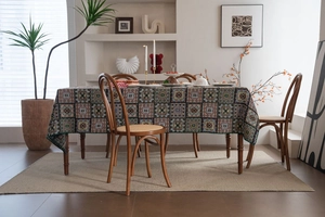Detailed close-up of colorful geometric jacquard tablecloth in vintage French style decor