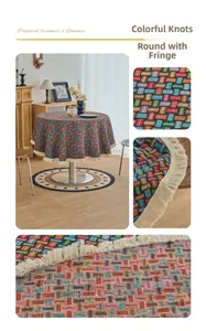 Detailed view of colorful woven knot pattern on round tablecloth with white fringe tassels