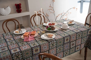 Detailed close-up of Bohemian jacquard tablecloth with colorful geometric patterns
