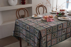 Macro detail of French retro jacquard tablecloth with colorful geometric patchwork textures