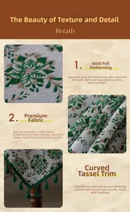 Detail of Christmas green floral tablecloth with gold foil print and handmade tassels