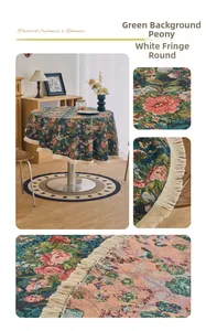 Detailed view of green jacquard tablecloth with pink peony pattern and white tassels