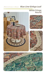 Detail of round jacquard tablecloth featuring blue ginkgo leaf patterns and white fringe