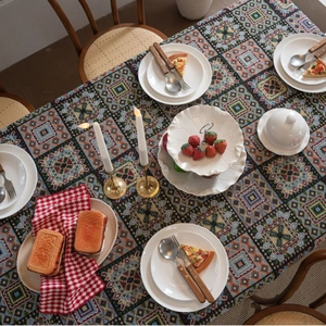 French vintage jacquard tablecloth with geometric bohemian patterns in vibrant retro colors