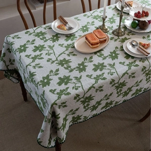 Elegante rechteckige Tischdecke mit grünem Blumenjacquard und feinen Ziernähten