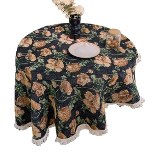 Vintage round tablecloth with jacquard floral patterns and elegant white fringe trim