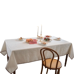 White jacquard tablecloth with Paisley pattern and brown scalloped edge for dining table