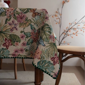 Floral and monstera leaf jacquard tablecloth with elegant scalloped embroidered edges
