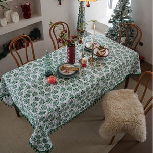 Green Christmas tablecloth with floral leaf patterns and elegant tassel edge decoration