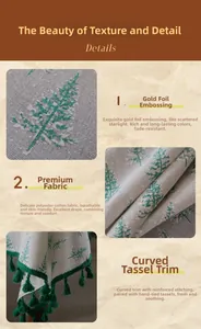 Detailed view of beige tablecloth with green glitter Christmas trees and fringe