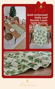 Detail of Christmas table runner with golden holly leaves and double-layer pointed ends