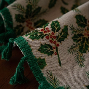 Christmas tablecloth with holly berry gold stamping and dark green fringe tassels