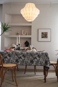 Detailed close-up of retro black botanical pattern on high-quality rectangle tablecloth