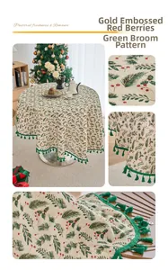 Close-up of pine needle print tablecloth with gold berry details and green tassels