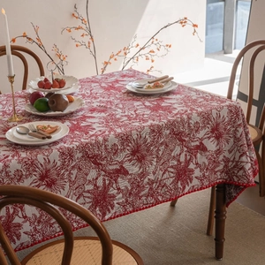 French vintage red jacquard tablecloth with cheetah and floral patterns with red pom-poms