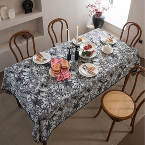 French vintage style rectangular tablecloth with black floral patterns on white cotton linen