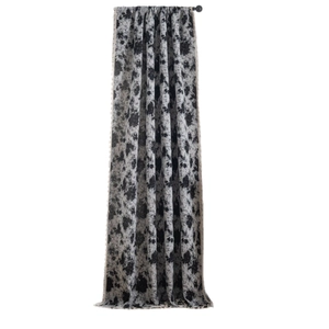 Modern black and white jacquard curtain with elegant white tassel fringe accents