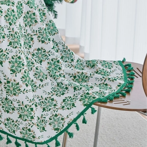 Christmas tablecloth with green pine needles print and elegant green fringe tassels