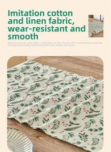 Detailed texture of cotton linen table runner with green leaf and red fruit patterns