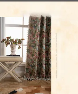 Macro detail of jacquard floral and butterfly curtains with vintage tassel fringe
