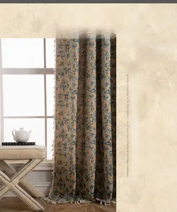 Detail of vintage floral jacquard curtains with cotton thread and elegant fringe tassels