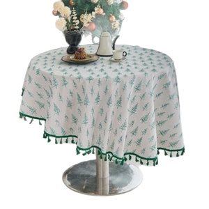 Round Christmas tablecloth with green pine tree prints and decorative tassel fringe edges