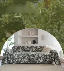 Macro detail of dark green floral jacquard sofa cover with elegant tassel fringe textures
