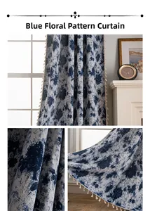 Detail of blue geometric jacquard fabric curtain with cream tassel fringe trimming