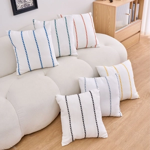 Modern minimalist geometric embroidery pillowcase with multi-color stripes on white fabric
