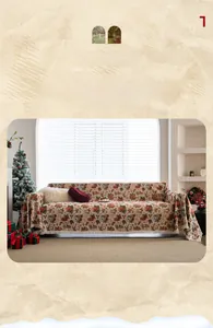 Detailed close-up of festive Christmas jacquard sofa throw with red green holiday patterns