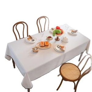 Minimalist white rectangular linen tablecloth with elegant black scalloped stitched edges