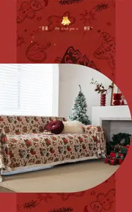 Close-up of thick jacquard sofa throw featuring gingerbread men and Merry Christmas patterns