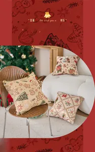Dettaglio del cuscino natalizio jacquard con motivi di omino di pan di zenzero e fiocchi
