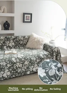Detailed texture of thick dark green floral chenille fabric for durable sofa cover