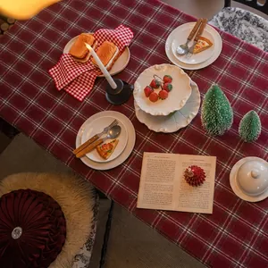 Thick wool-like red plaid tablecloth for Christmas dining with a cozy festive atmosphere