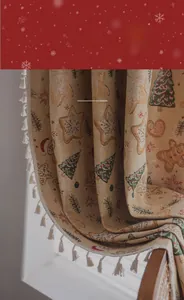 Detail of Christmas gingerbread man jacquard fabric with 50% shading and white fringe tassels