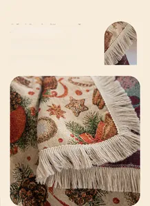 Detailed close-up of festive Christmas jacquard throw blanket with elegant beige tassels