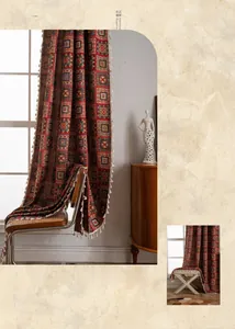 Detail of red geometric curtains featuring vintage patterns and white tassel edge decoration