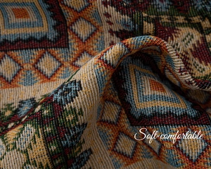 Detail showing high-quality jacquard weave with ethnic geometric patterns on soft fabric