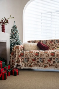 Detail of Christmas throw blanket with vintage jacquard pattern and short tassels