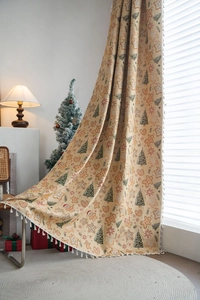 Detail of Christmas gingerbread man tapestry with white fringe and festive woven patterns