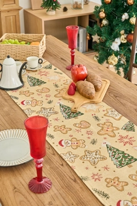 Detail des Weihnachts-Tischläufers mit Lebkuchenmann-Jacquard und Fransen-Quasten