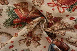 Detailed view of heavy jacquard fabric with Christmas motifs and woven textures